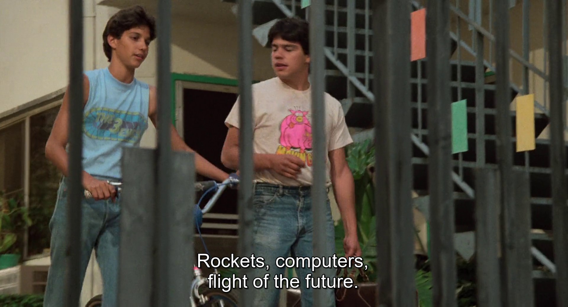 
Daniel and Freddy having the dialogue described above.
The subtitles read: Rockets, computers, flight of the future.
